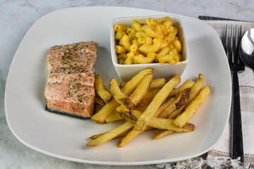 boked salmon with mac and cheese and fries