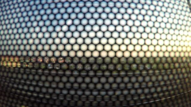 Background footage of a sun protection film attached to the window of a running BTS sky train (metro train) symbolizing obstacle to see what's really going on. 4k 3840x2160, wide and static shot.