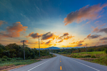 Roads and nature in Thailand,Concrete road and beautiful mountain scenery,Concrete road and beautiful mountain scenery,asphalt road in thailand