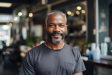 Obraz premium Portrait of a middle aged African American hair salon owner