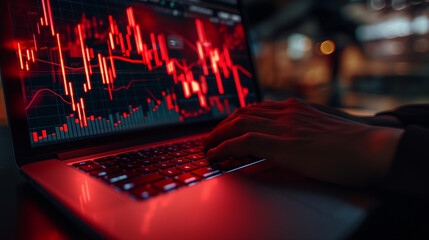 Businessman use laptop with virtual world economic growth chart with red warning sign for caution in investing economic situation warning, Business investment risks