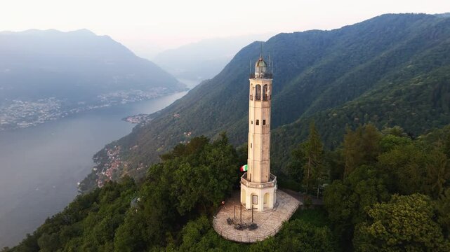 Aerial Orbit Drone Footage of the Faro Voltiano Volta Lighthouse in Brunate, Como lake, Como province, Lombardy, Italy