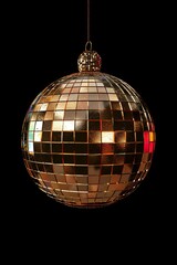 Obraz premium Golden Disco Ball Hanging On Black Background.