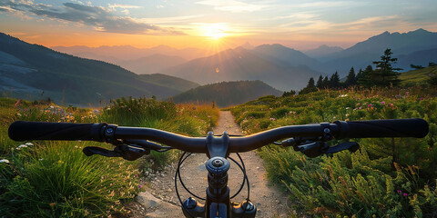 Naklejka premium Mountain Biking at Sunset with a Breathtaking View