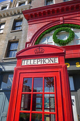 Fototapeta premium Famous red phone box infront of Leicester Square Station in Universal Studios, Orlando where Hogwarts Express is departing