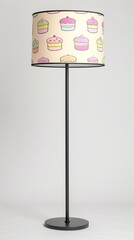 Cute cupcake pattern lampshade on black metal floor lamp for cozy home decor concept