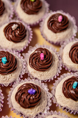 White brigadeiro with chocolate topping, party sweet