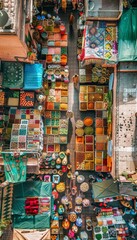 Fototapeta premium Aerial View of Bustling Moroccan Market with Colorful Stalls, Spices, and Fabrics for Cultural Richness