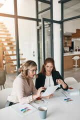 Fototapeta premium Documents, women or analyst in meeting for results, performance report or sales portfolio. Research, business or happy people with paperwork, agenda or project notes for teamwork, trends or planning