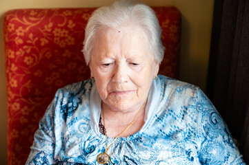 Portrait of a 95 yo white hair grandmother home, Flanders, Belgium