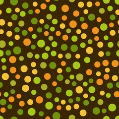 Geometrical seamless pattern. Many small orange green circles on dark brown background. Abstract background with different rings. Decorative autumn design element. Minimalist print for design projects