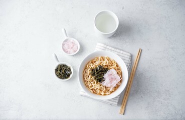 Ramen noodles with seaweed and radish in a bowl