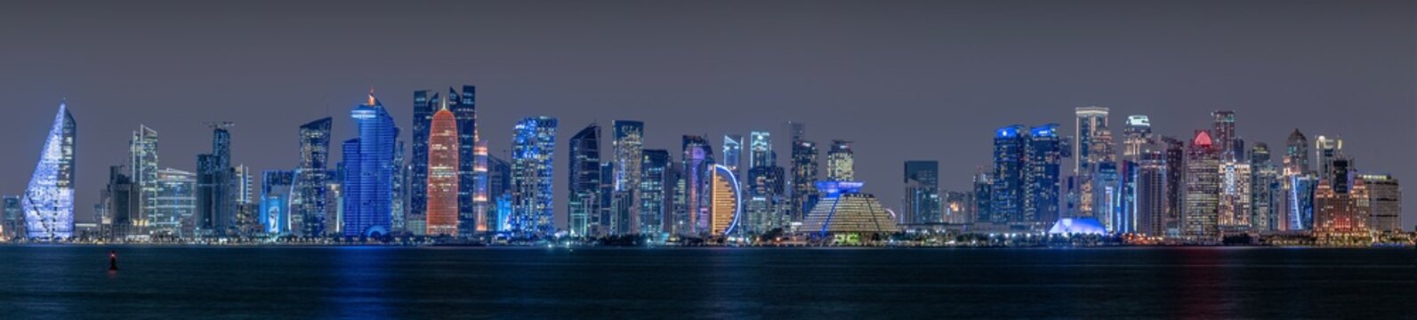 Panoramic view of Doha skyline at night, Qatar 05-04-2024