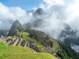 Early morning before the crowds arrive and before the clouds completely clear at Machu Picchu.