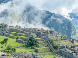 Early morning before the crowds arrive and before the clouds completely clear at Machu Picchu.