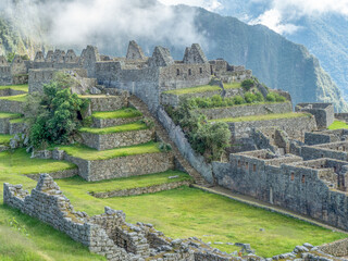 Early morning before the crowds arrive and before the clouds completely clear at Machu Picchu.
