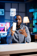 Technology expert excited to review newly launched mockup smartphone, comparing features with older models. Influencer filming video for social media, analyzing isolated screen mobile phone