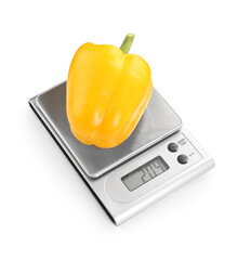 Kitchen scale with bell pepper isolated on white