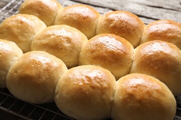 Many delicious dough balls on table, closeup