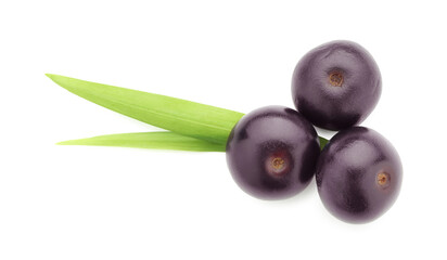 Fresh ripe acai berries and green leaves isolated on white, top view