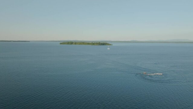 Island in Lake with boats