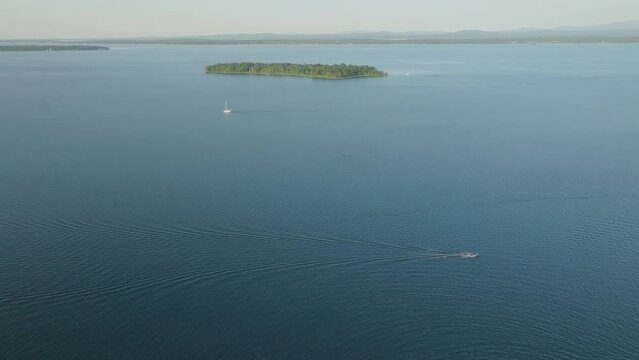 Island in Lake with boats