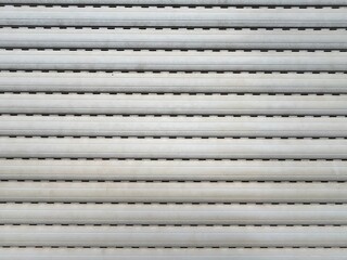 Grey horizontal jalousine slats as background 