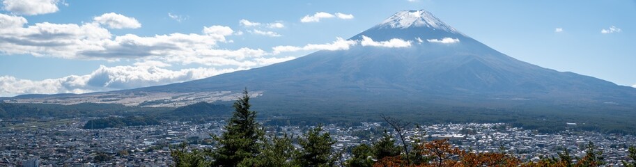 Huge panorama from Kawaguchiko Sengen Shrine with partial cloud and snow coverage on Mt Fuji,...