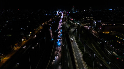 Aerial view of vehicular traffic on a highway with overnight power outage