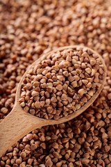 Wooden Spoon with Raw Buckwheat, Close-Up