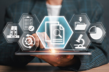 A business professional uses a tablet with futuristic interface icons representing data analysis, research, and documentation for a case study concept.