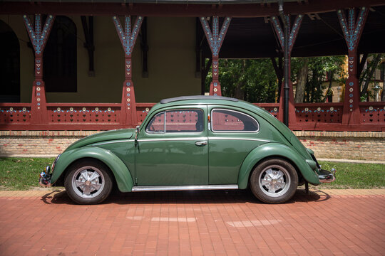 Side view of  Volkswagen Beetle (1954-1958) in green color. Palic, Serbia, 30.06.2024