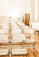 Row of Folded Chairs Chapel Church Gym