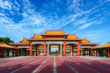 pier stretching into the sea at sunset with a serene sky and clouds above the ocean