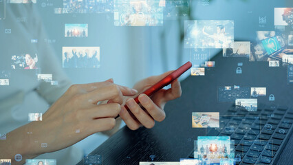 A woman using computer and smart phone in office and digital contents concept.