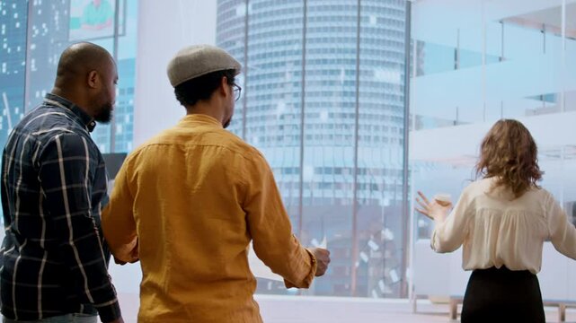 Startup team doing planning session for an office lease agreement, requesting legal assistance for contract negotiation. Evaluating architectural blueprints during office tour, real estate. Camera A.