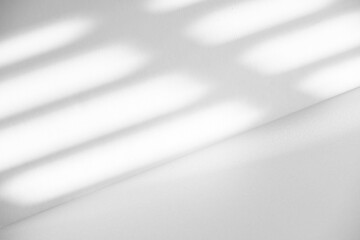 Wall interior background, studio and backdrops show products.with shadow from window color white and grey. background for text insertion and presentation product	
