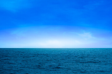 Ocean sea background and the clear sky For summer vacation ideas Nature of summer sea water with sunlight The sea sparkles against the blue sky