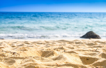 Nature of the beach and sea Summer with sunshine, sandy beaches, clear blue waters sparkling against the blue sky. On an island with good ecology and environment Background for summer vacation concept