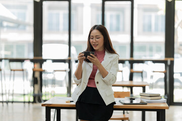 Businesswomen  Working and talking about work documents at the office.