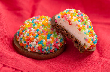 Chocolate Cookie Topped with Marshmallow and Rainbow Colored Sprinkles