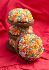 Chocolate Cookie Topped with Marshmallow and Rainbow Colored Sprinkles