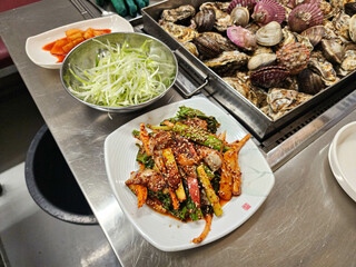 korean food. Oyster spicy sauce Salad