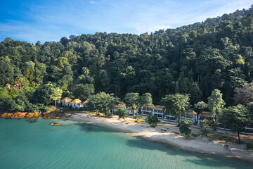 Tropical beach island Koh Chang with scenery palm tree above the crystal clear azure ocean water on nature background Lonely beach, Koh Chang Thailand