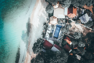 Beautiful morning view coastline tropical beach with scenery bungalow near crystal clear ocean...