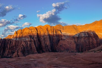 Rocky landscape and mountain range at sunrise at Snow Canyon, Ivins, Utah, United States of America.