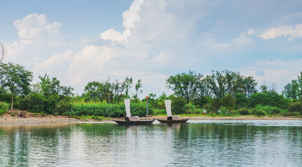 The mountains, Oujiang River, and fishing boats in Lishui City, Zhejiang Province, China