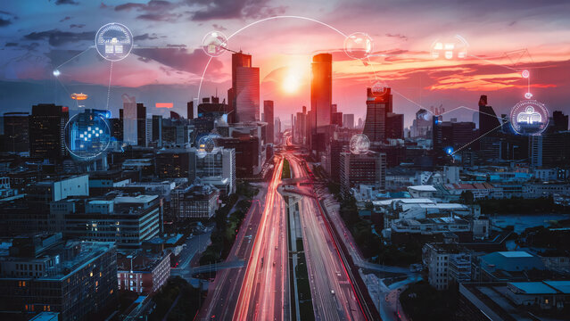 Smart city skyline at sunset with digital icons for urban innovation.