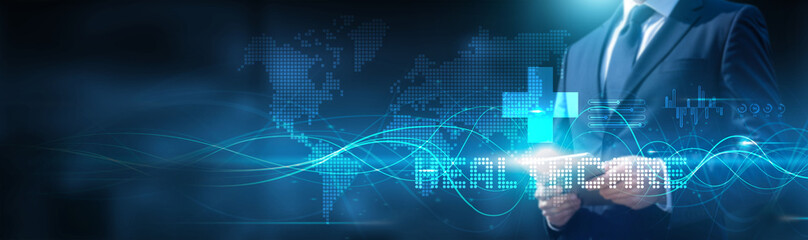 Businessman using tablet on healthcare global network connection on innovation and growth with digital data and development of healthcare. Technology and solutions integration. Efficiency, advancement
