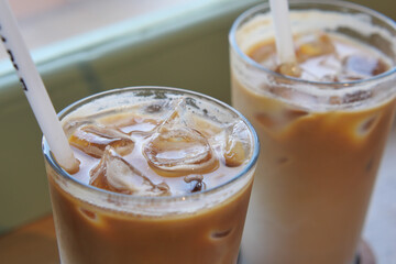 iced late in a transparent glass on cafe table 